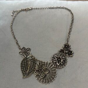 Radiant Silver Pendant Necklace with Intricate Detailing